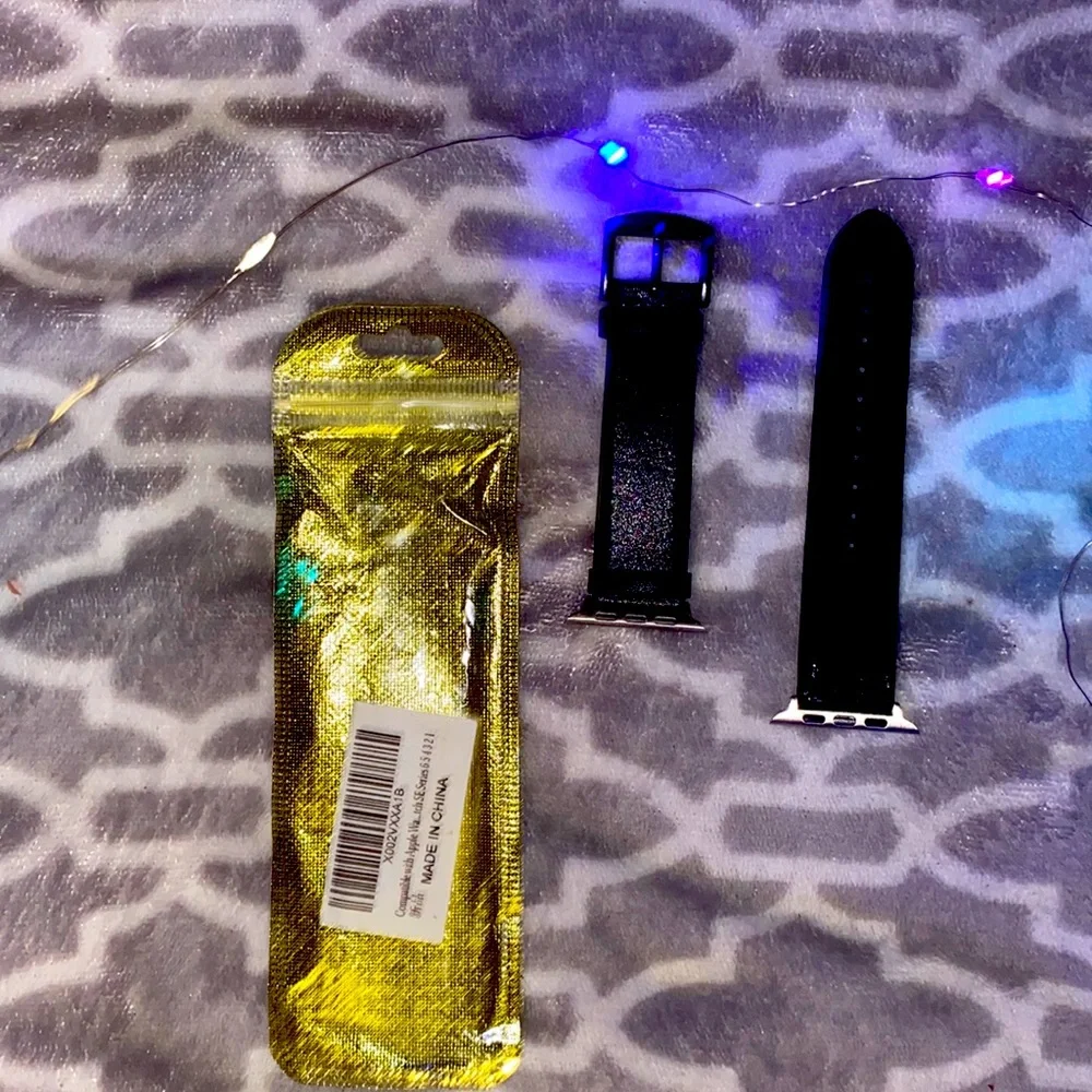 NWT a Apple Watch band black reversible leather side& other is like tire tracks